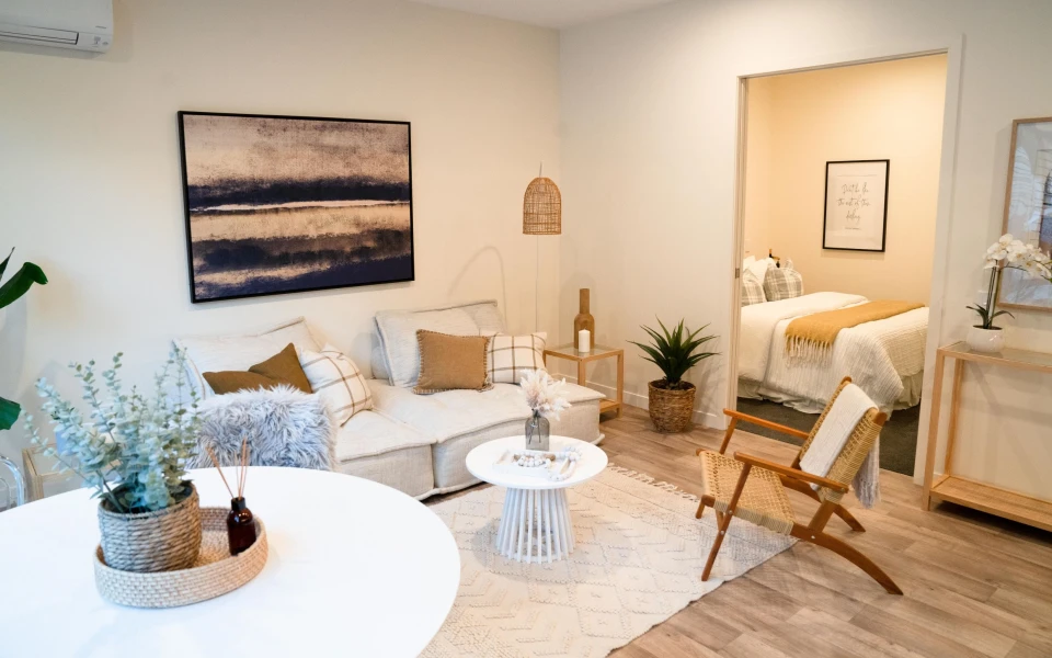Internal view of Live Work apartment at Te Pā Tāhuna. Shows living space and bedroom.