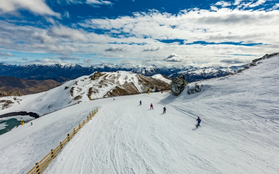 People skiing at Coronet Peak Queenstown New Zealand