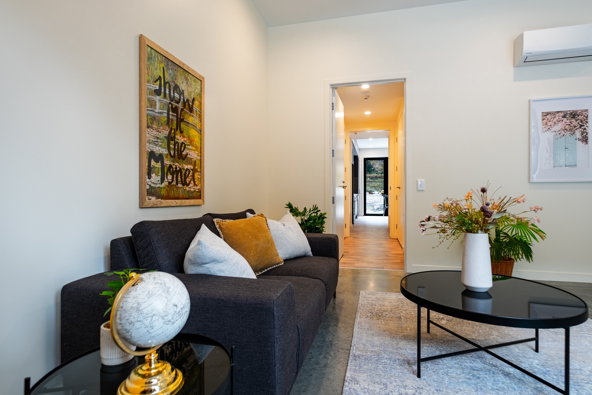 Showing the internal work space of the Live Work apartments. Looking through to living area.
